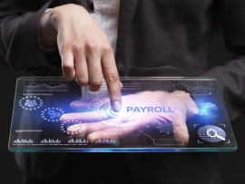 A businessperson touching a screen that says payroll.