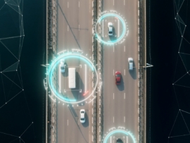 4k aerial view of self driving autopilot cars driving on a highway with technology tracking them, showing speed and who is controlling the car